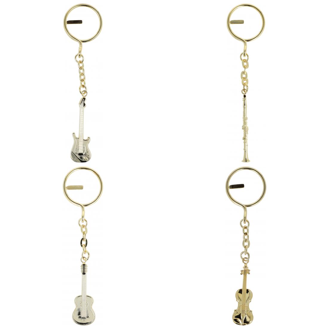 golden metal keychains shaped as instruments or treble clefs