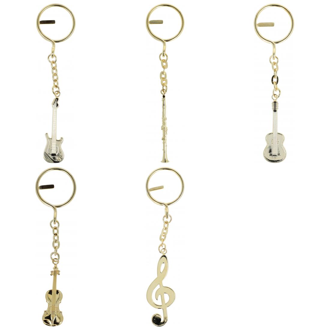 golden metal keychains shaped as instruments or treble clefs