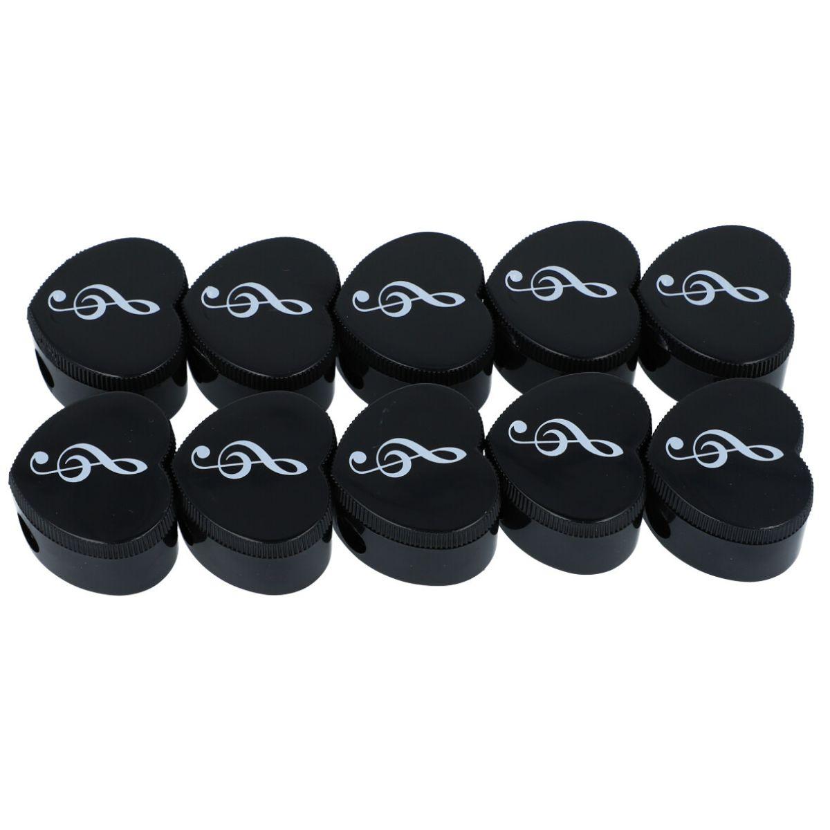 Heart-shaped pencil sharpener with musical note print, treble clef, note mix, keyboard