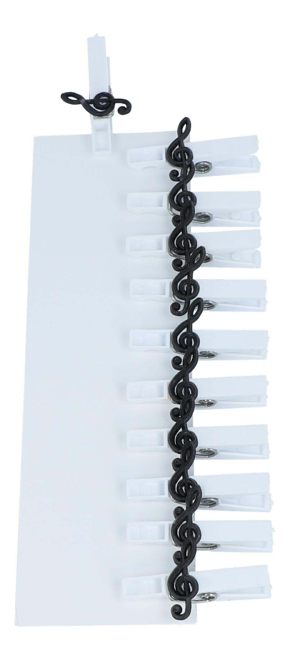white brackets with attached treble clef