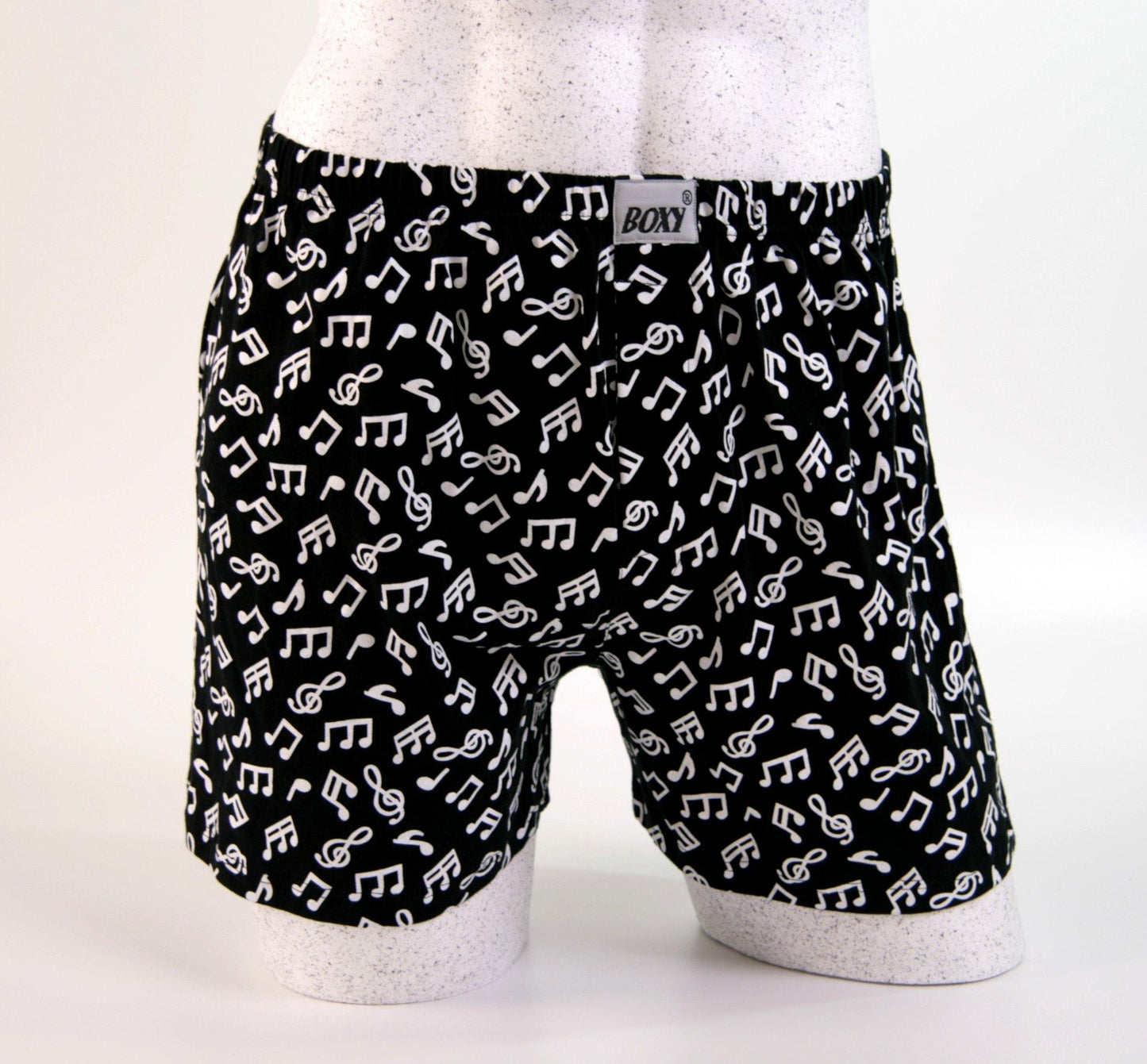 black boxer shorts with white notes, in two sizes