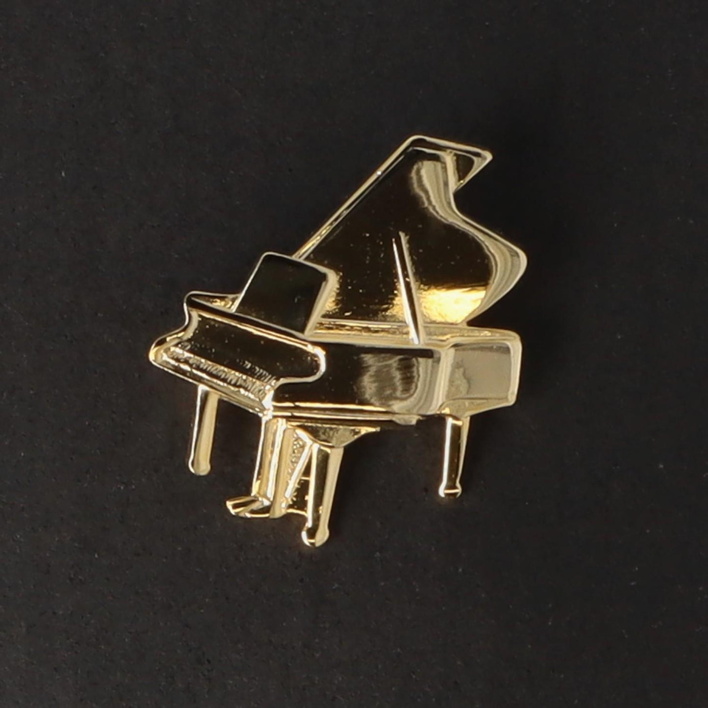Instrument brooch, various designs, gold-plated