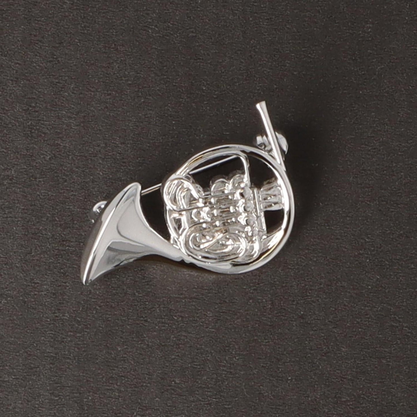 Instrument brooch, various designs, silver-plated
