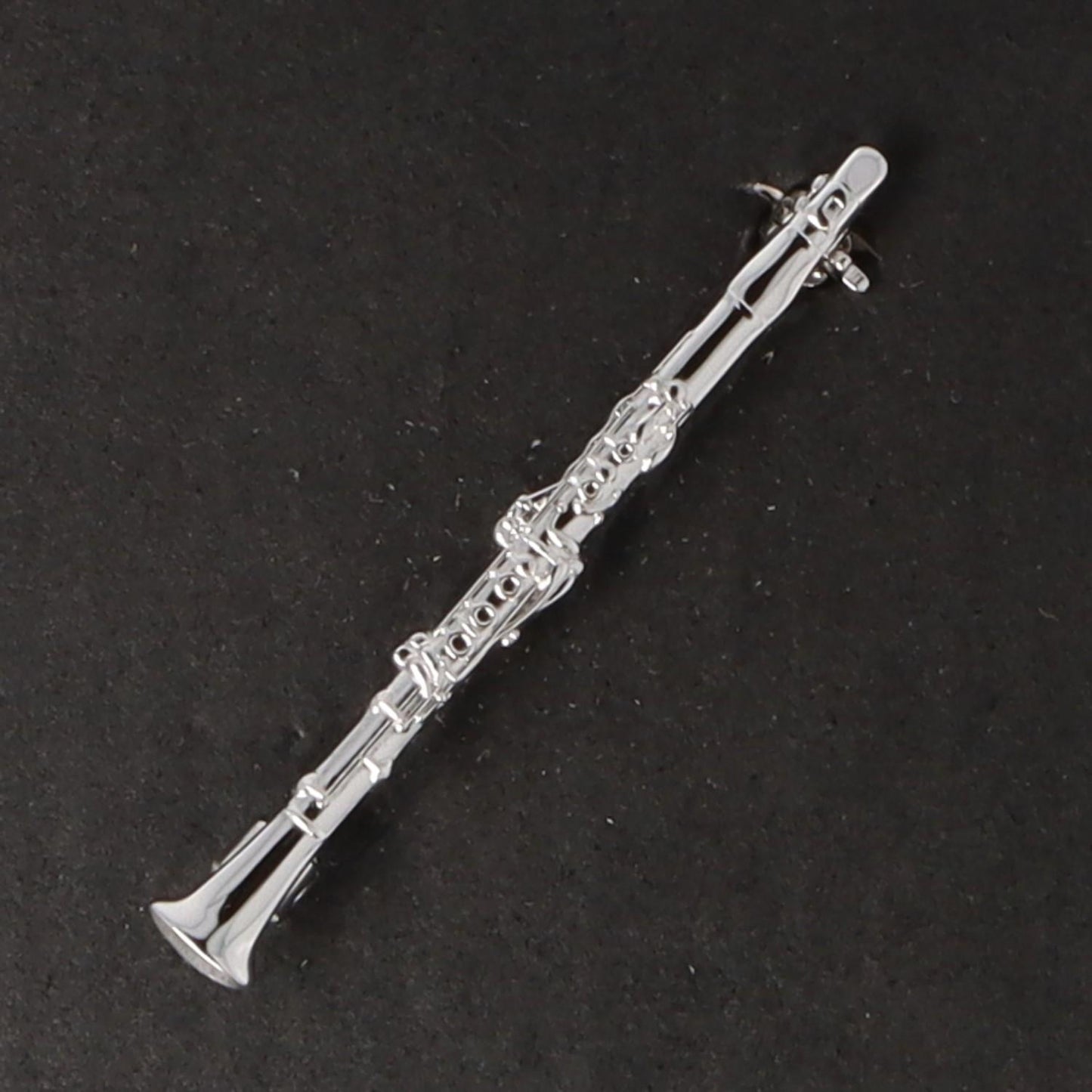 Instrument brooch, various designs, silver-plated