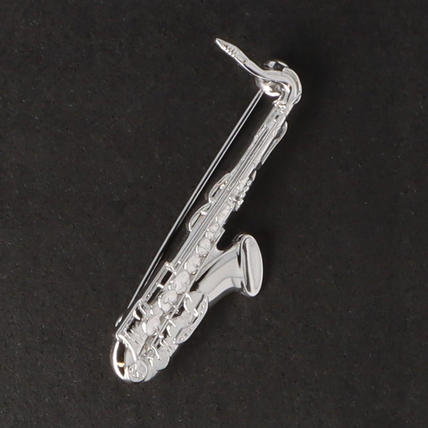 Instrument brooch, various designs, silver-plated