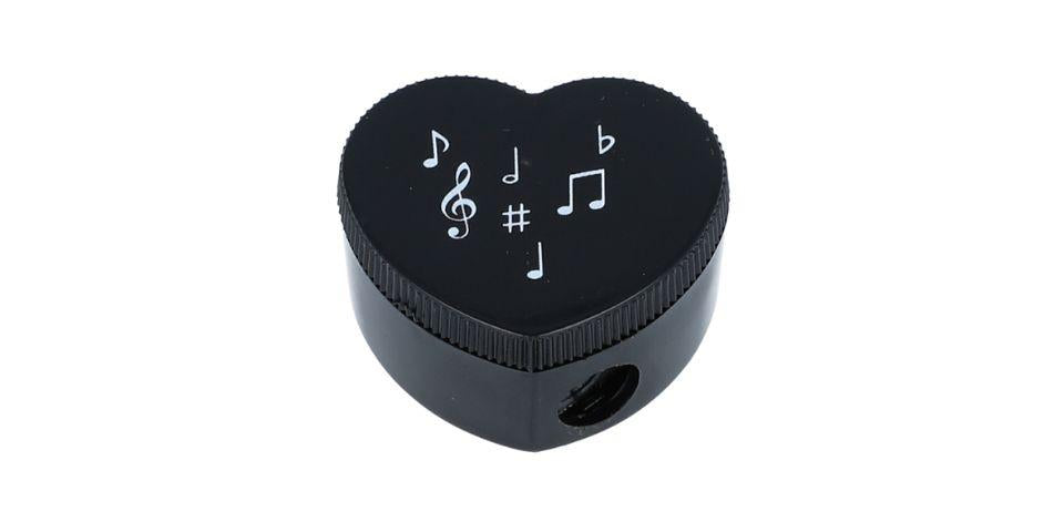 Heart-shaped pencil sharpener with musical note print, treble clef, note mix, keyboard