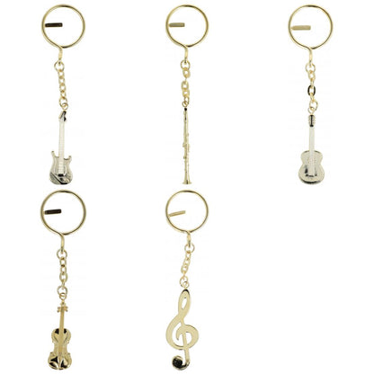 golden metal keychains shaped as instruments or treble clefs