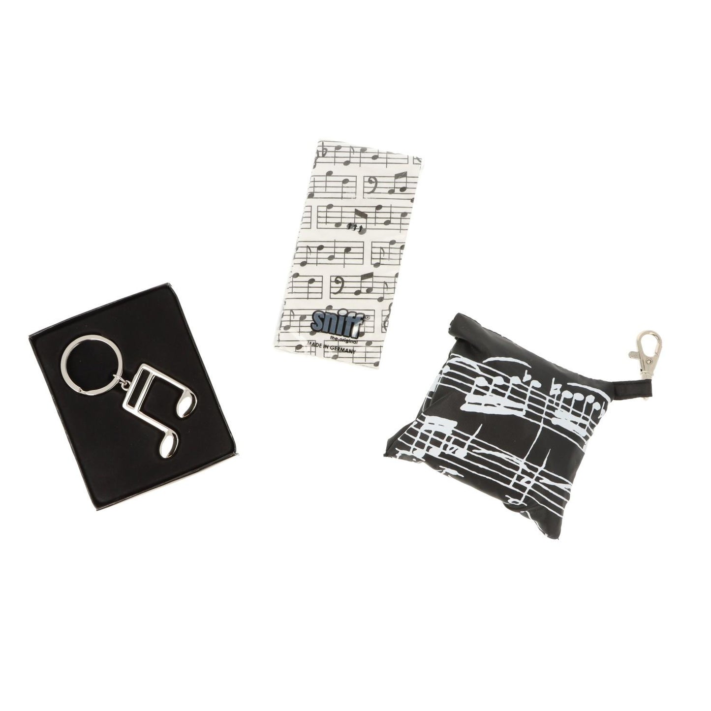 Gift set with shaped keychain, tissues and shopping bag