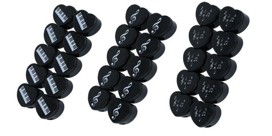 Heart-shaped pencil sharpener with musical note print, treble clef, note mix, keyboard