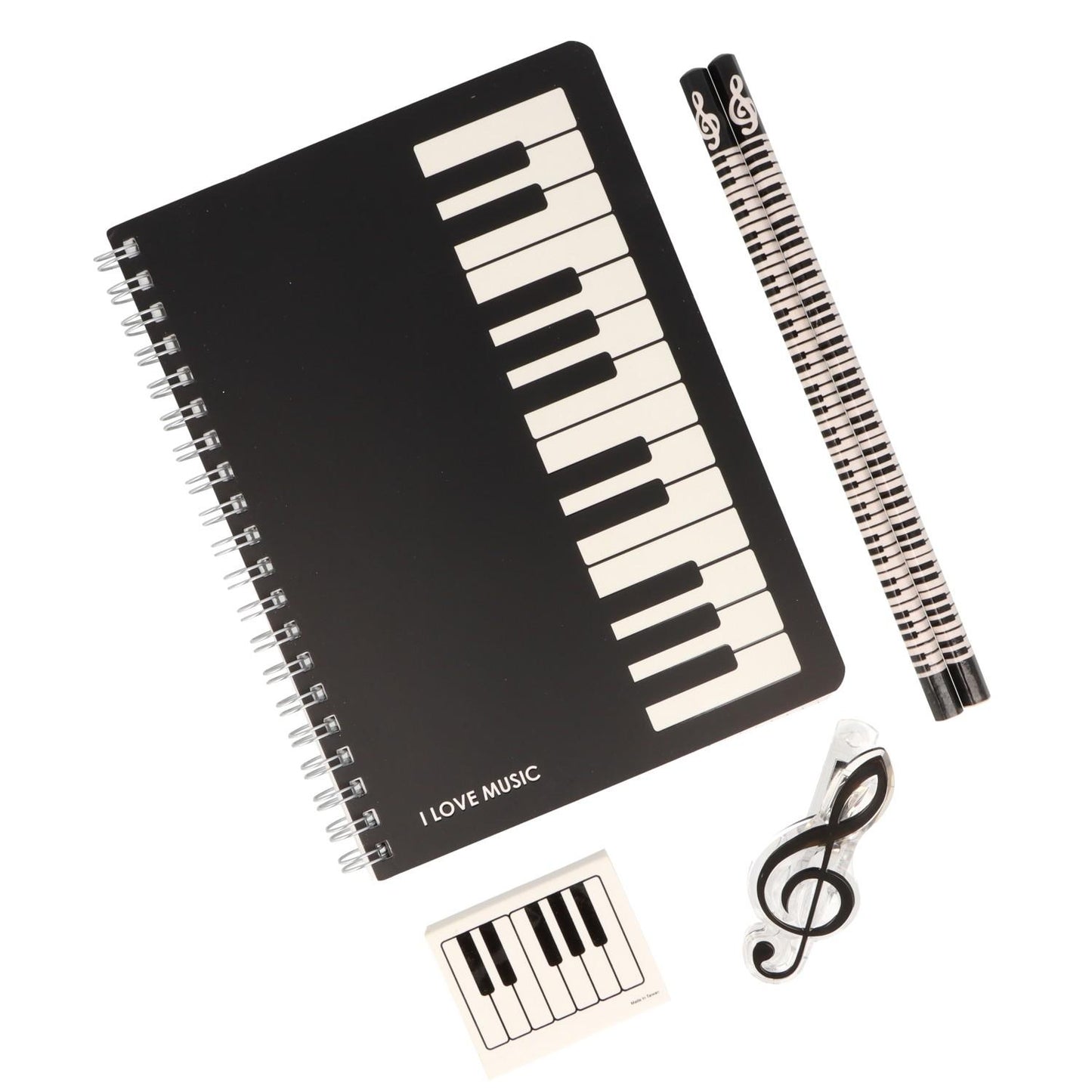 Writing set consisting of a spiral notebook, 2 hexagonal keyboard pencils, treble clef clip and keyboard eraser