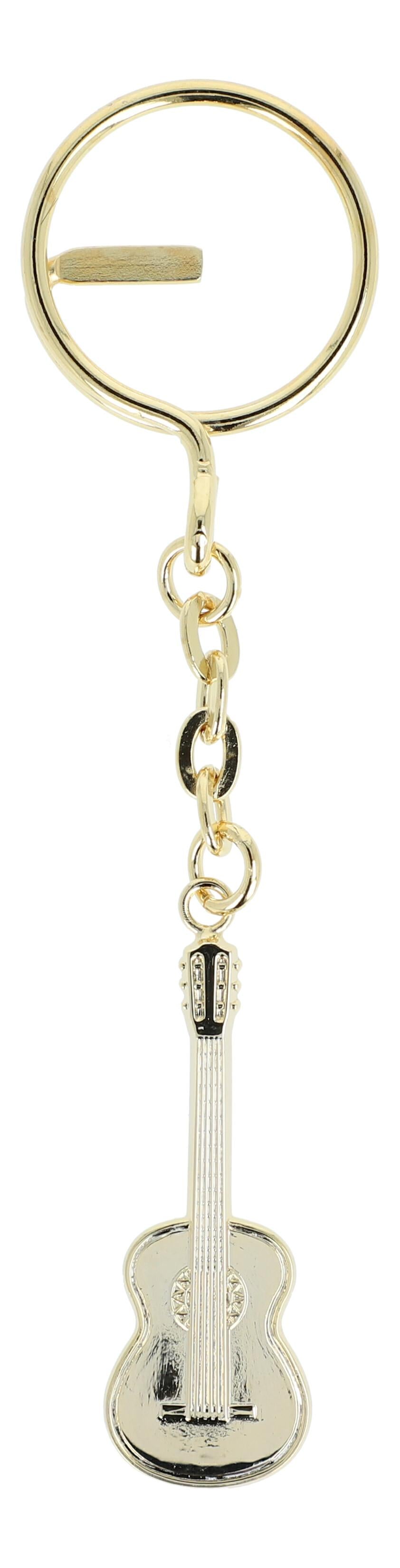 golden metal keychains shaped as instruments or treble clefs