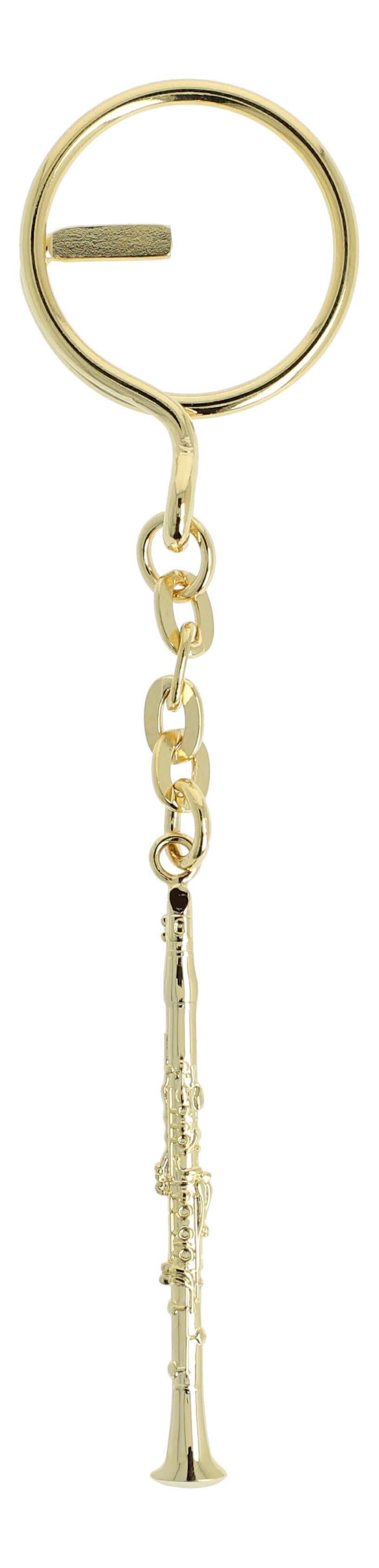 golden metal keychains shaped as instruments or treble clefs