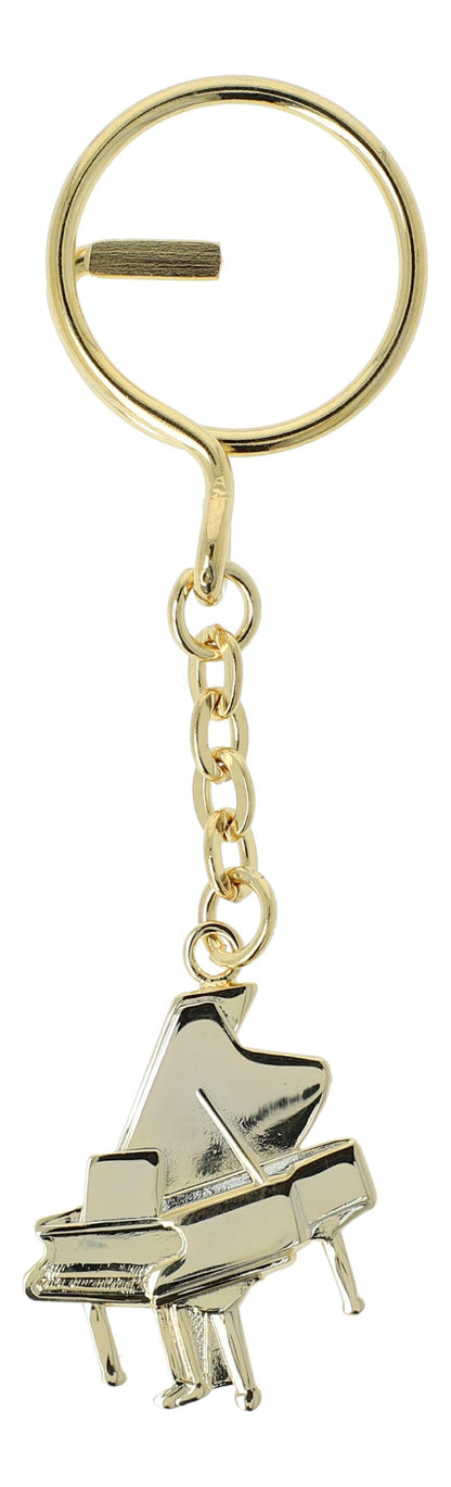 golden metal keychains shaped as instruments or treble clefs