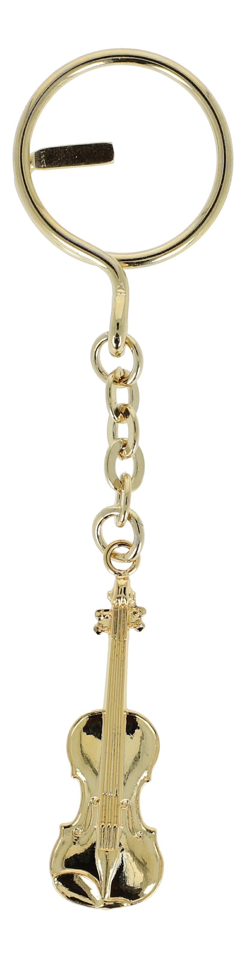 golden metal keychains shaped as instruments or treble clefs