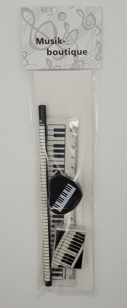 Keyboard writing set with pencil, eraser, sharpener and ruler