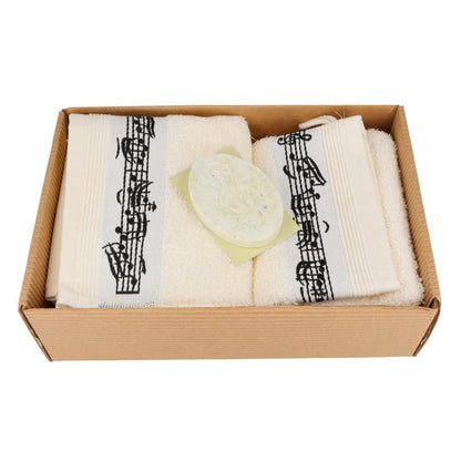 musikalisches Geschenkset mit Gästehandtuch, Waschhandschuh und Salzseife Limette im Geschenkkarton