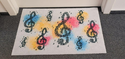 colorful doormat with treble clefs and notes