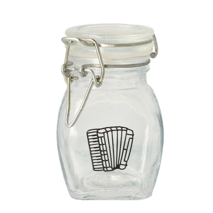 Mini storage jar with various instruments in black