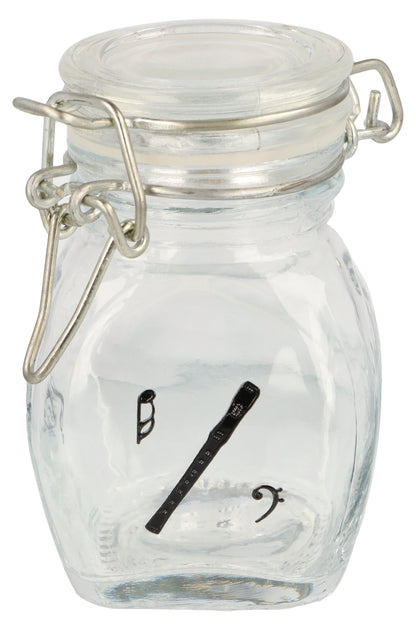 Mini storage jar with various instruments in black