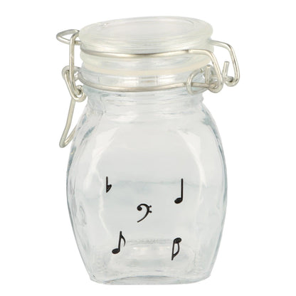 Mini storage jar with various instruments in black