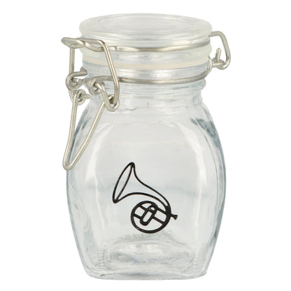 Mini storage jar with various instruments in black