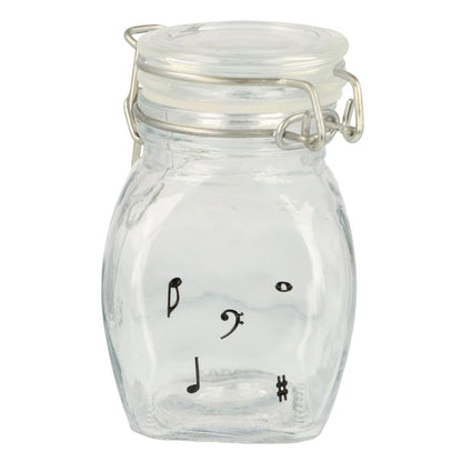 Mini storage jar with various instruments in black