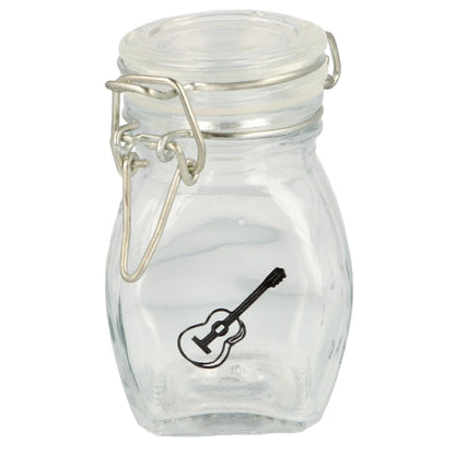 Mini storage jar with various instruments in black