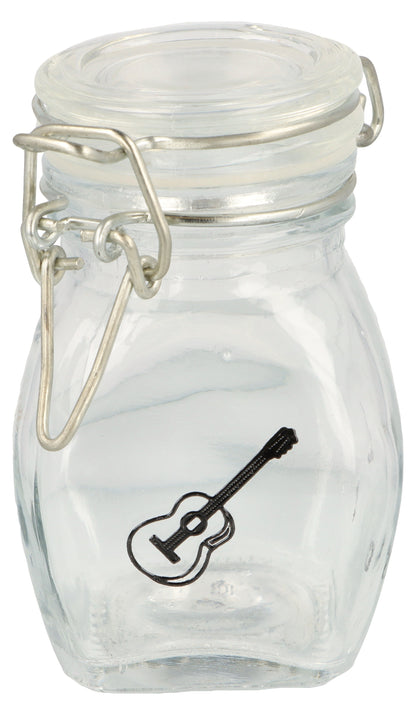 Mini storage jar with various instruments in black