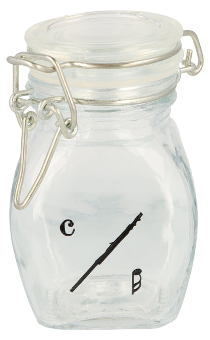 Mini storage jar with various instruments in black