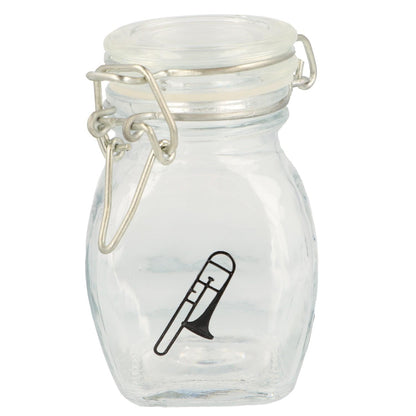 Mini storage jar with various instruments in black