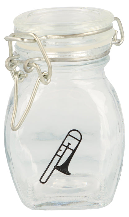 Mini storage jar with various instruments in black