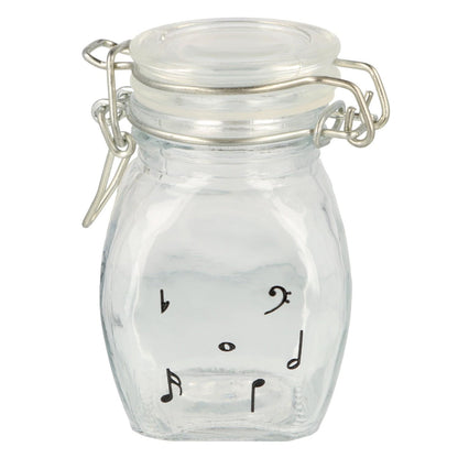 Mini storage jar with various instruments in black