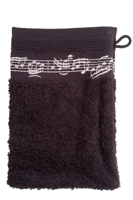 black washcloth with woven music line, notes