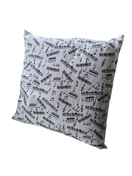 filled pillow with notes and clefs