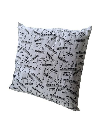 filled pillow with notes and clefs