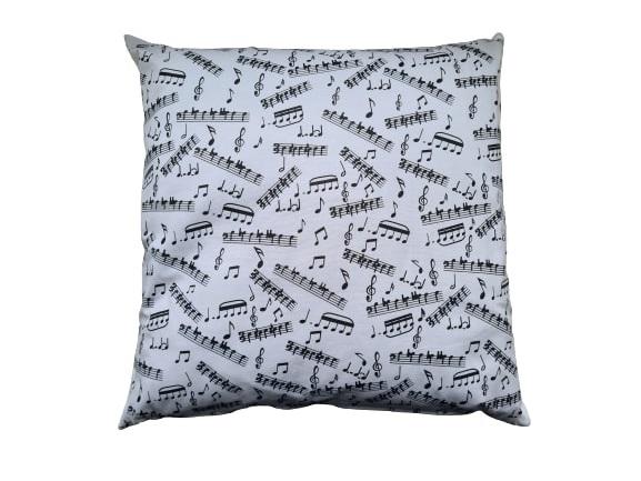 filled pillow with notes and clefs