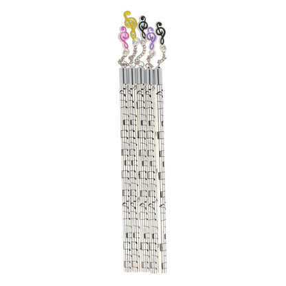 Pencils in white with black music lines and colorful treble clef pendants