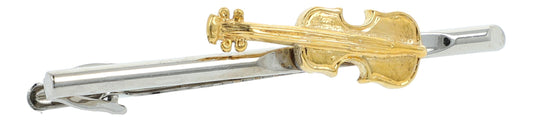 silver tie clip with golden cello