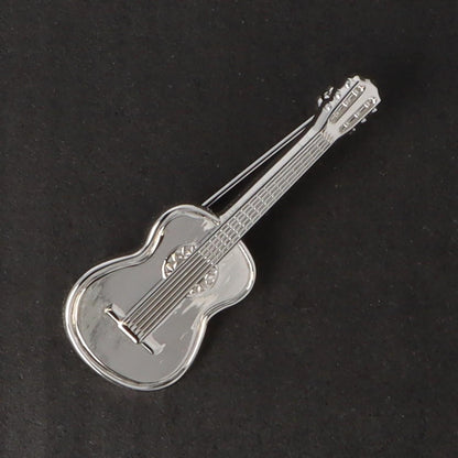 Instrumenten-Brosche, verschiedene Ausführungen, versilbert