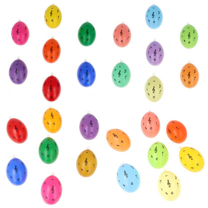 Set of 7 decorative Easter eggs with treble clef and notes, various colors