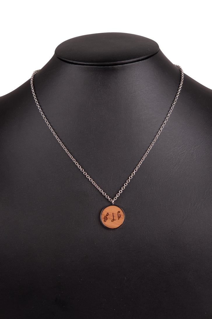 Note mix pendant made of stainless steel and walnut