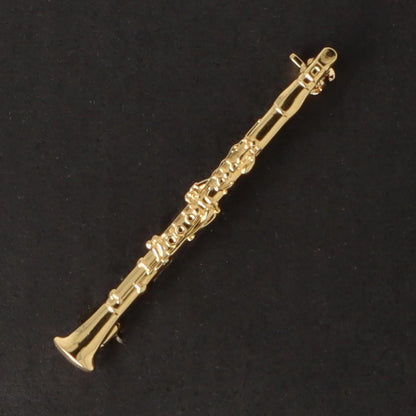 Instrument brooch, various designs, gold-plated